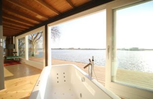 luxe chalets rotterdam Natuurhuisje Go With The Flow